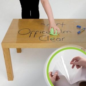 Self adhesive whiteboard clear film applied to desk