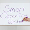 Smarter Surfaces smart self adhesive whiteboard film applied to desk