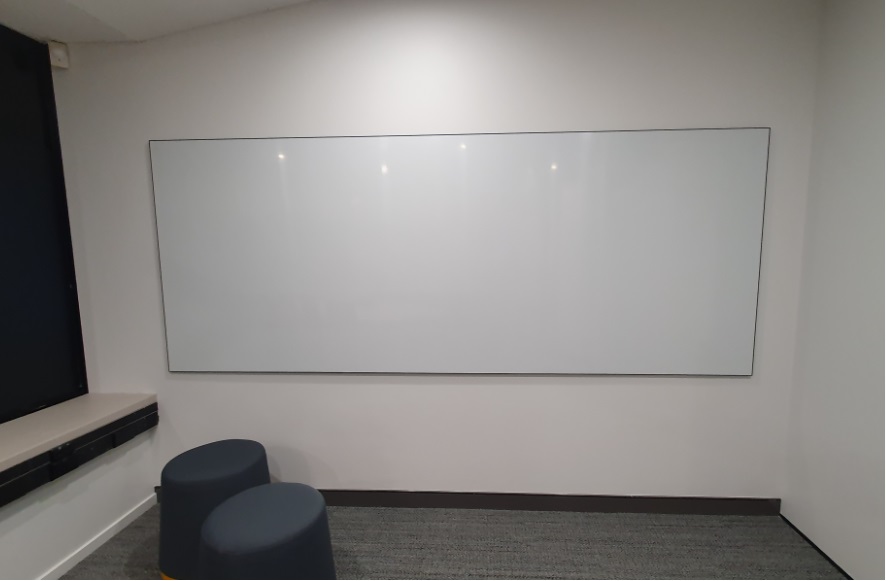 Slim black frame ceramic whiteboard.